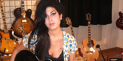 Amy Winehouse cambia la canción por la moda